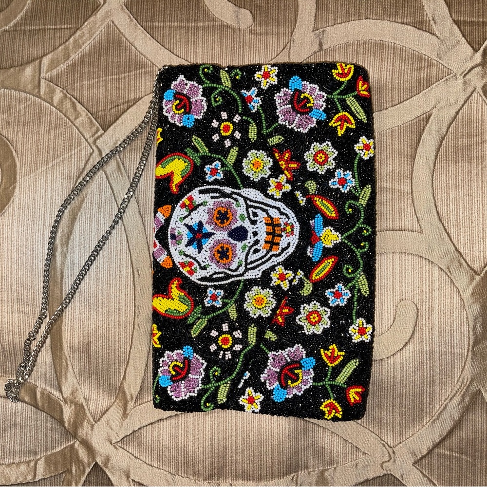Beaded skull and flower clutch